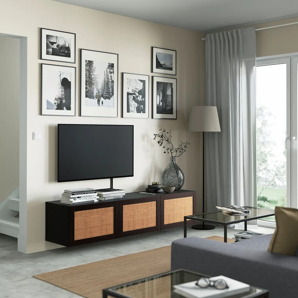 Modern living room with BESTÅ tv unit, art wall, sofa & coffee table.