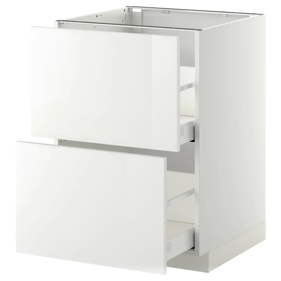 A white METOD kitchen cabinet with two open drawers. The cabinet a modern, glossy design.