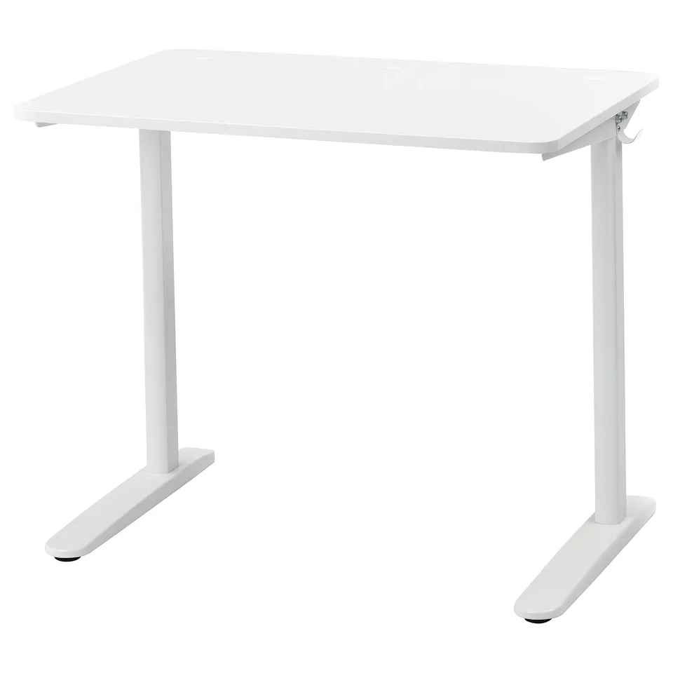 A white RELATERA adjustable desk with a rectangular top and four straight legs, designed for small spaces.
