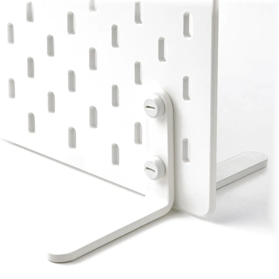 White freestanding pegboard with rounded edges and evenly spaced holes, featuring two adjustable knobs for stability.