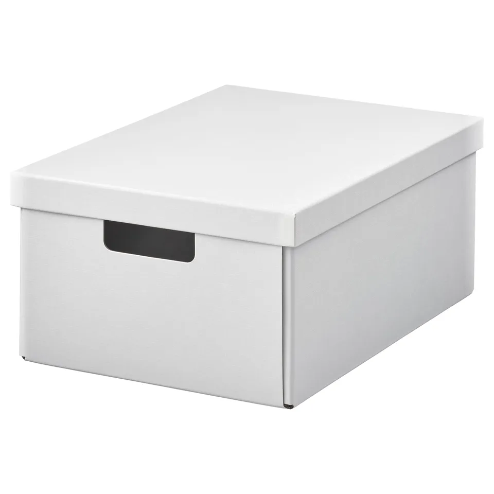 A white FJÄDERHARV storage box with a lid and handle, made of recycled paper.