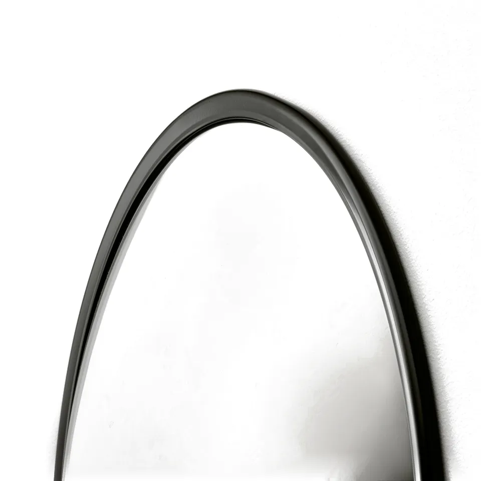Circular decorative mirror with sleek, dark frame. Modern design, high-quality finish.