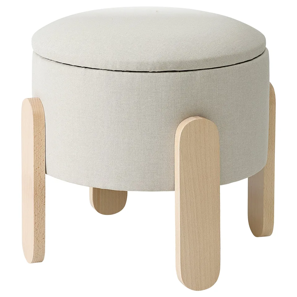 Round FÖRLUNDA stool in light grey fabric with wooden legs.
