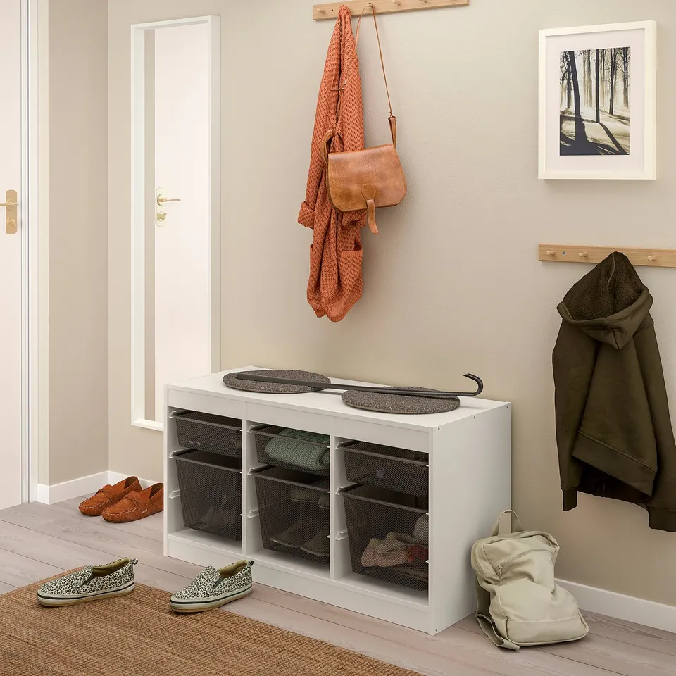 TROFAST white shoe storage with mesh baskets.