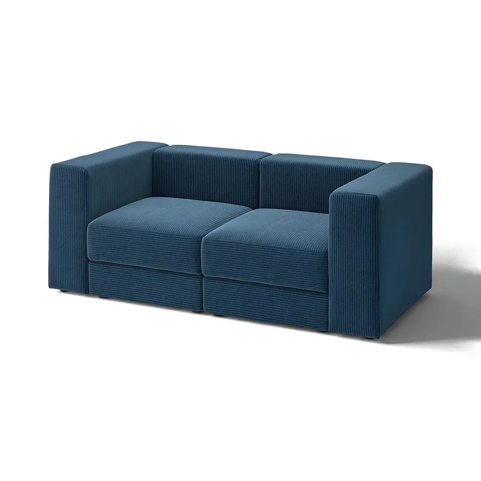 Blue modular sofa, JÄTTEBO, with clean lines and soft comfort, perfect for relaxation.