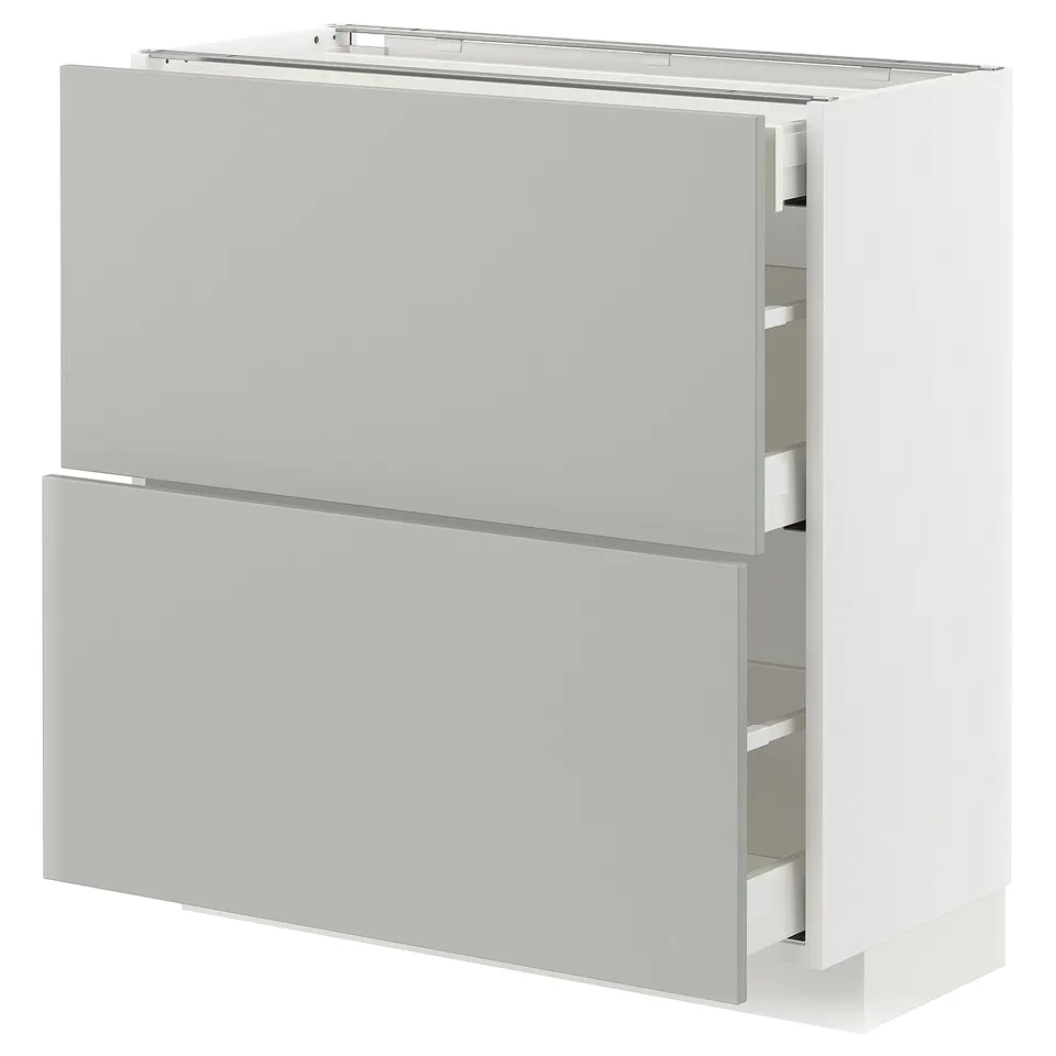 Ikea METOD white drawer unit; sleek, modern design; light grey drawers; rectangular shape.