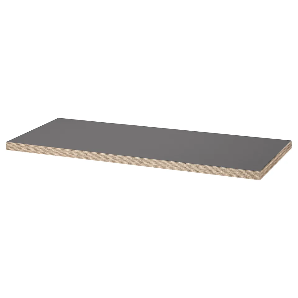 LAGKAPTEN desk: grey, rectangular, fiberboard top, honeycomb paper filling, wooden edge, four metal legs.