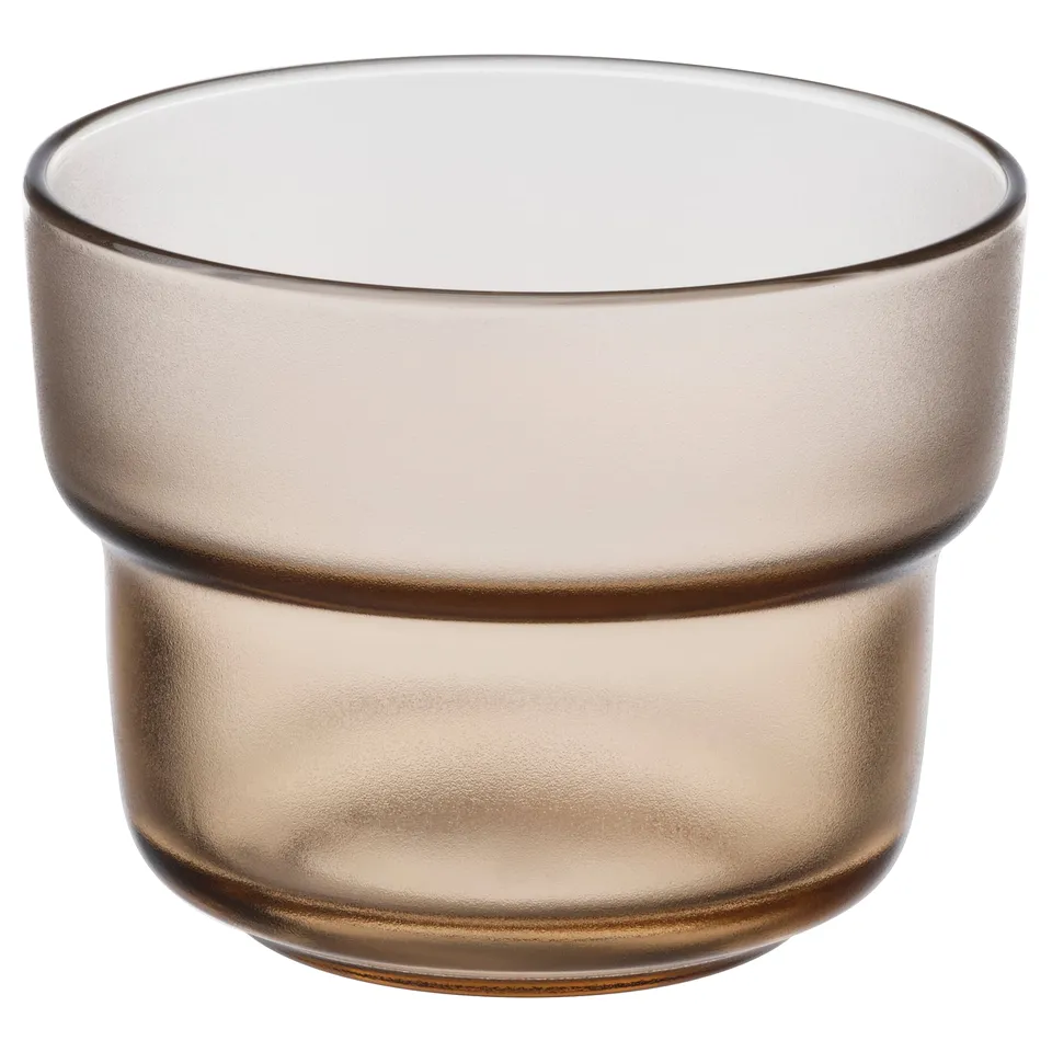 Translucent amber glass cup, round shape with wide mouth, crafted texture, stacked design.