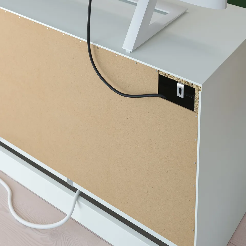 Cable outlet on back of tv bench for organised wiring.