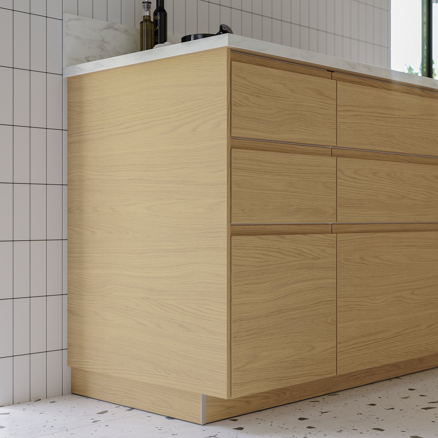Modern kitchen with light wood cabinets, clean design, and dark flooring.