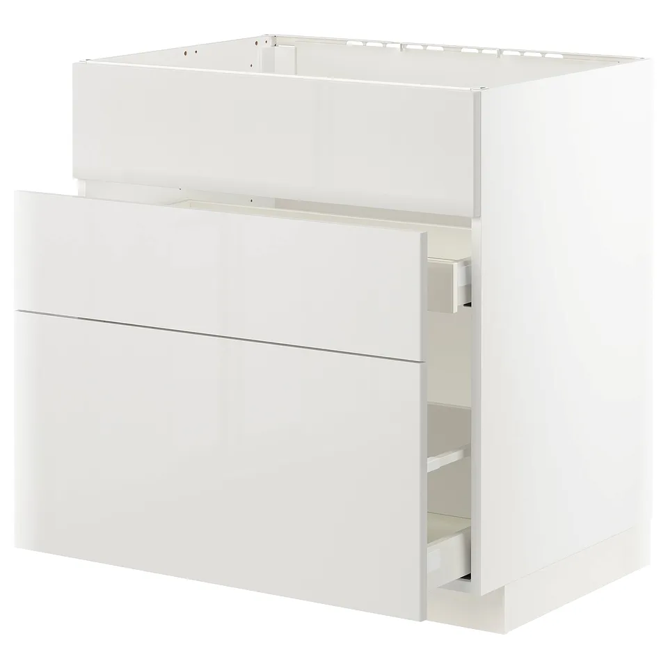 A white METOD kitchen cabinet with high gloss, smooth drawer fronts. It has a sleek, modern design with a clean, minimalist look.