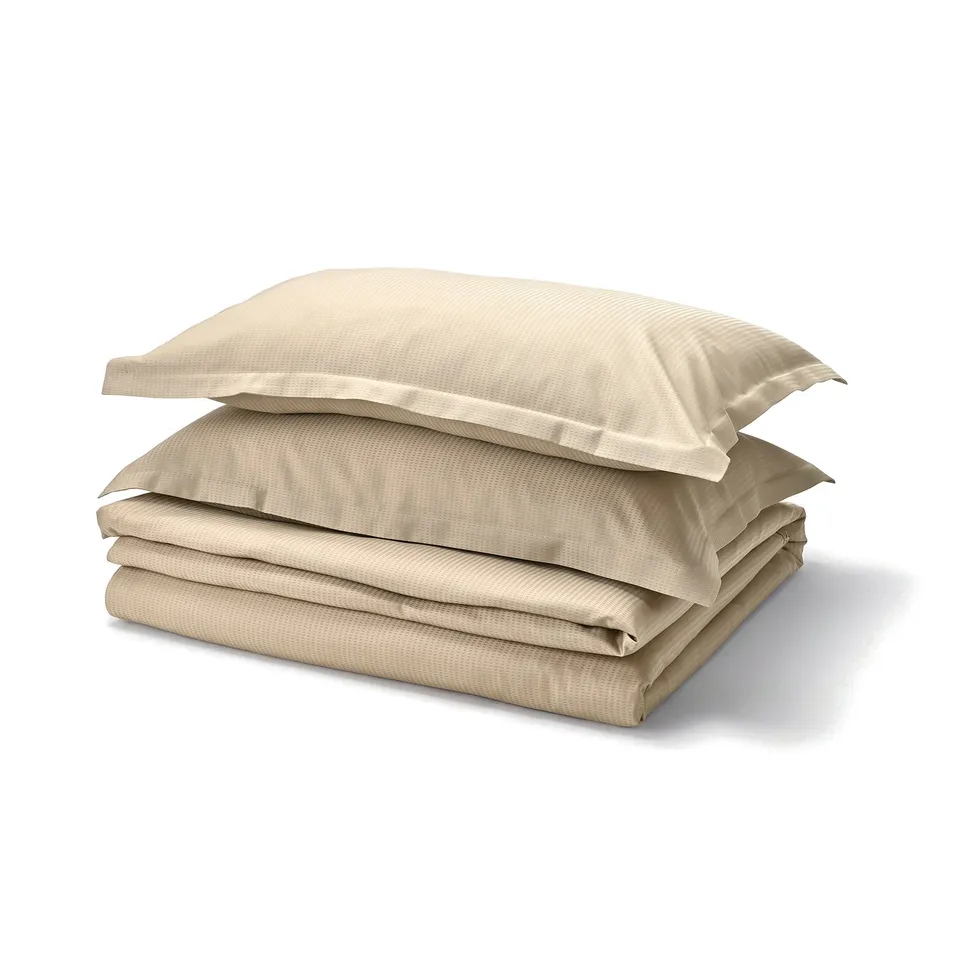 Tan LÄKEVÄNDEROT duvet & pillow set, 100% lyocell, button closure.