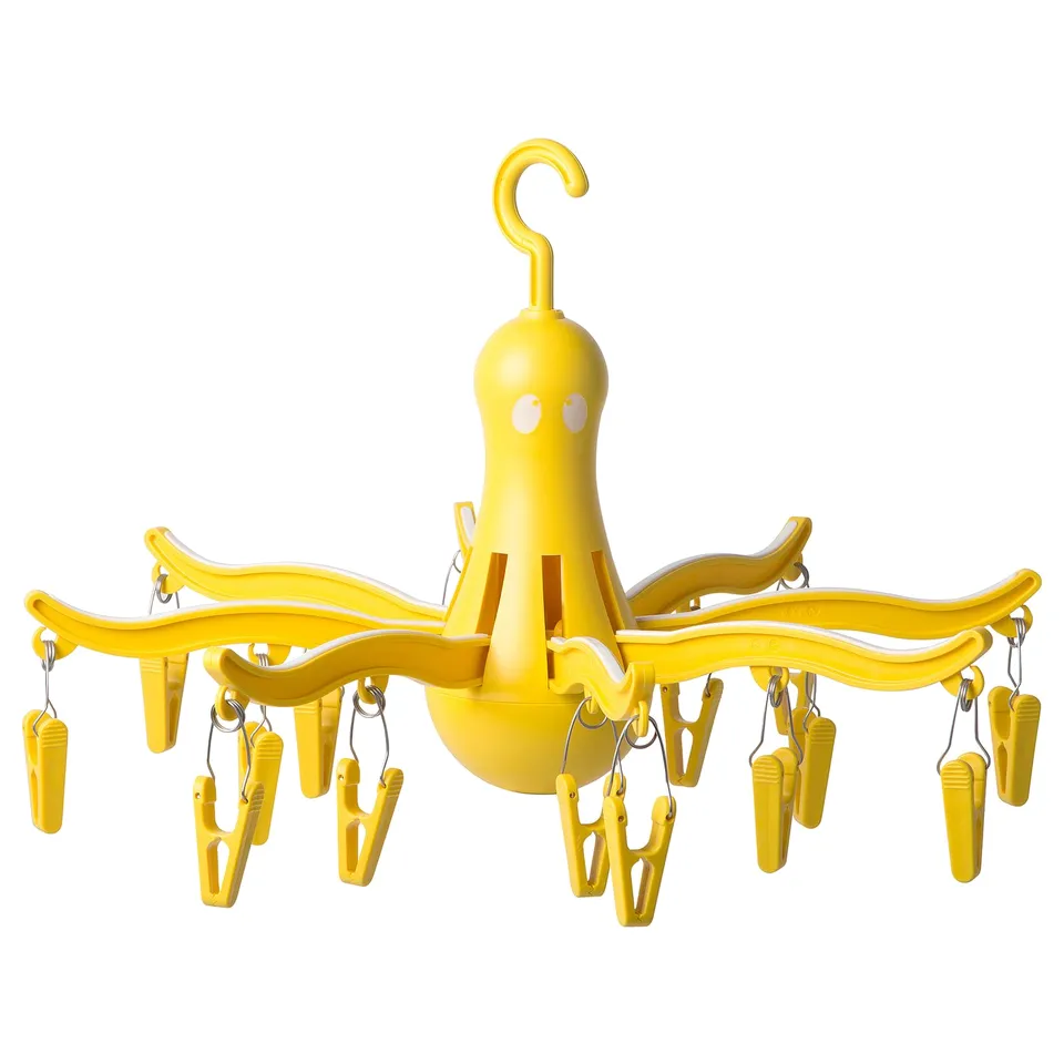 Bright yellow PRESSA drying octopus with 16 pegs, hanging design, recycled plastic.