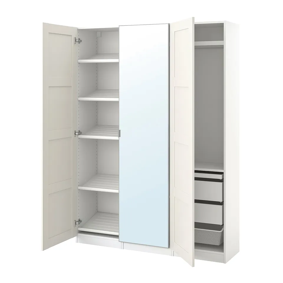 White PAX wardrobe with mirrored doors, metal shelves, and mesh baskets.
