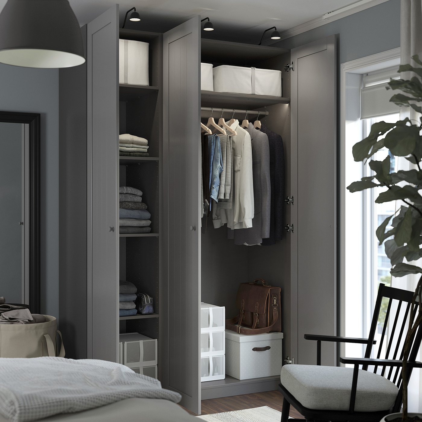 Modern bedroom with open wardrobe, clothes, towels, and accessories neatly organised inside. Soft-closing hinge and adjustable feet visible.