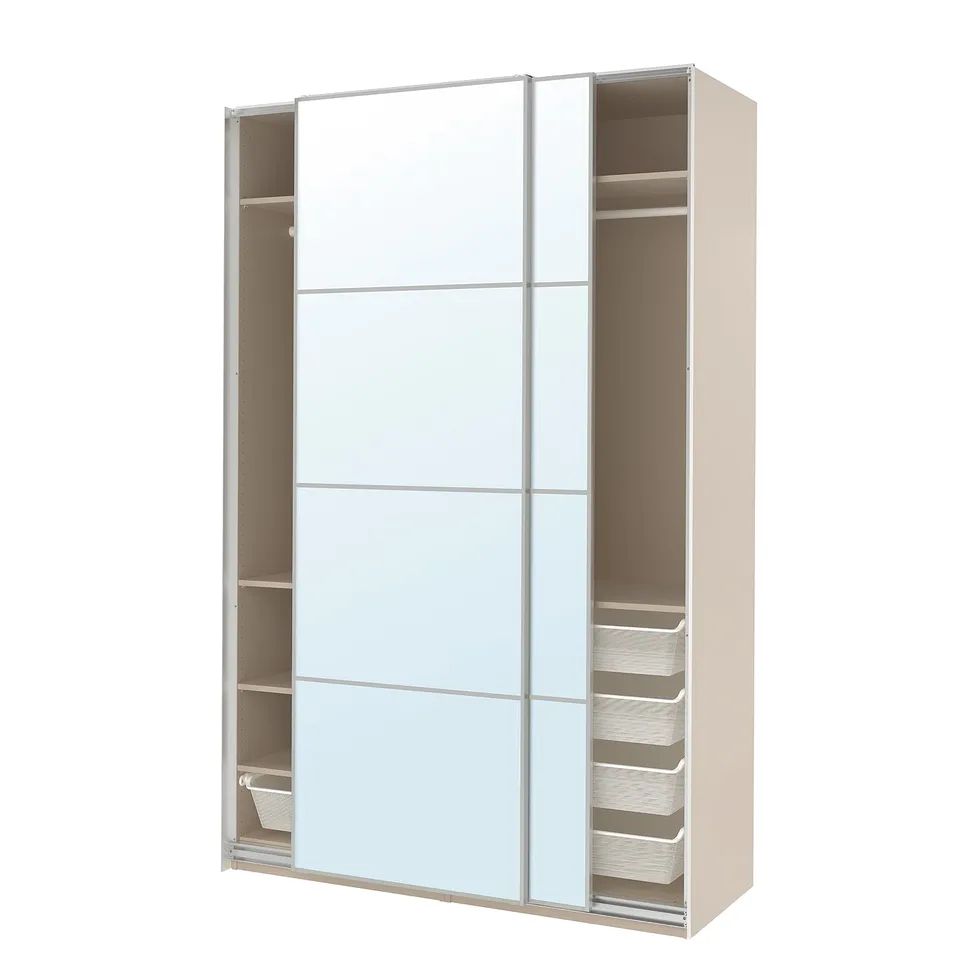 A white PAX wardrobe with sliding doors and internal shelves.