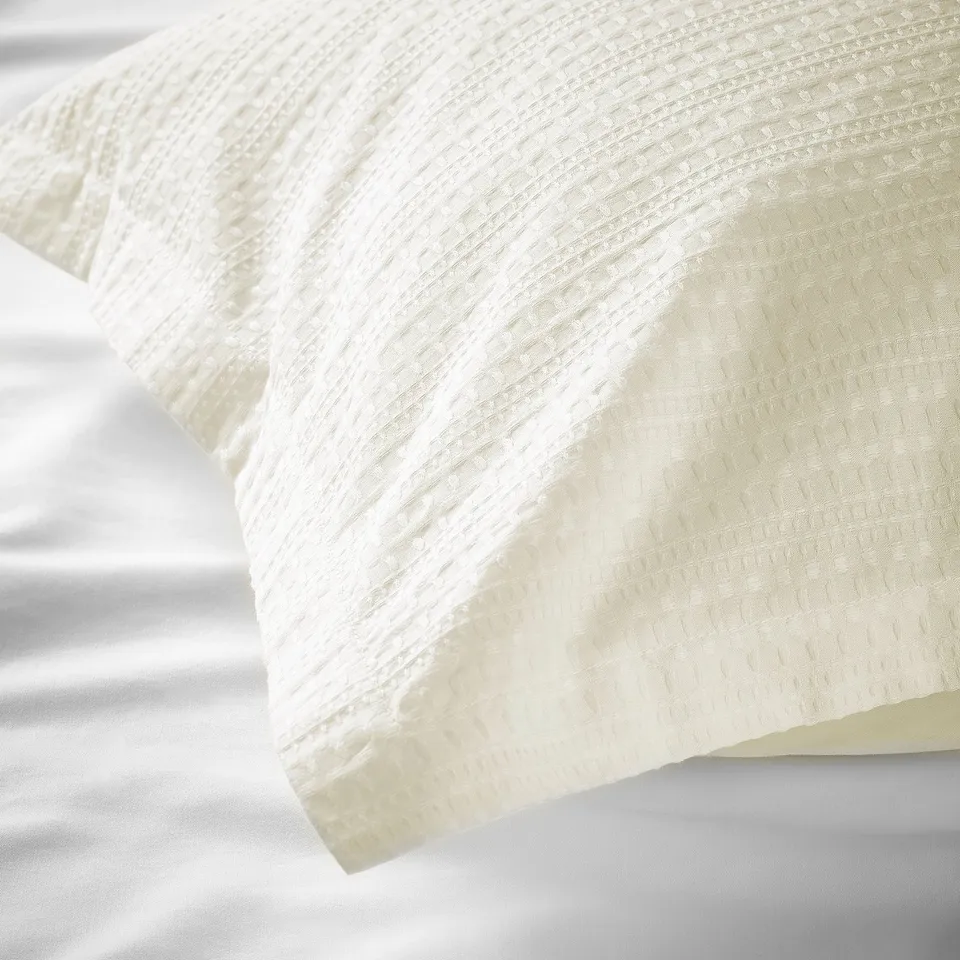 Crisp white waffle duvet, soft cotton weave.