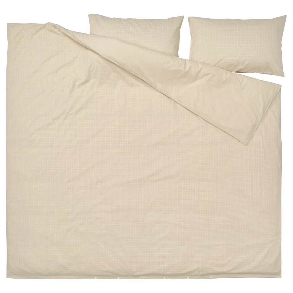 Beige & white DOFTAKLEJA duvet set, 100% cotton with stitched check pattern, stripes, & corner pockets.