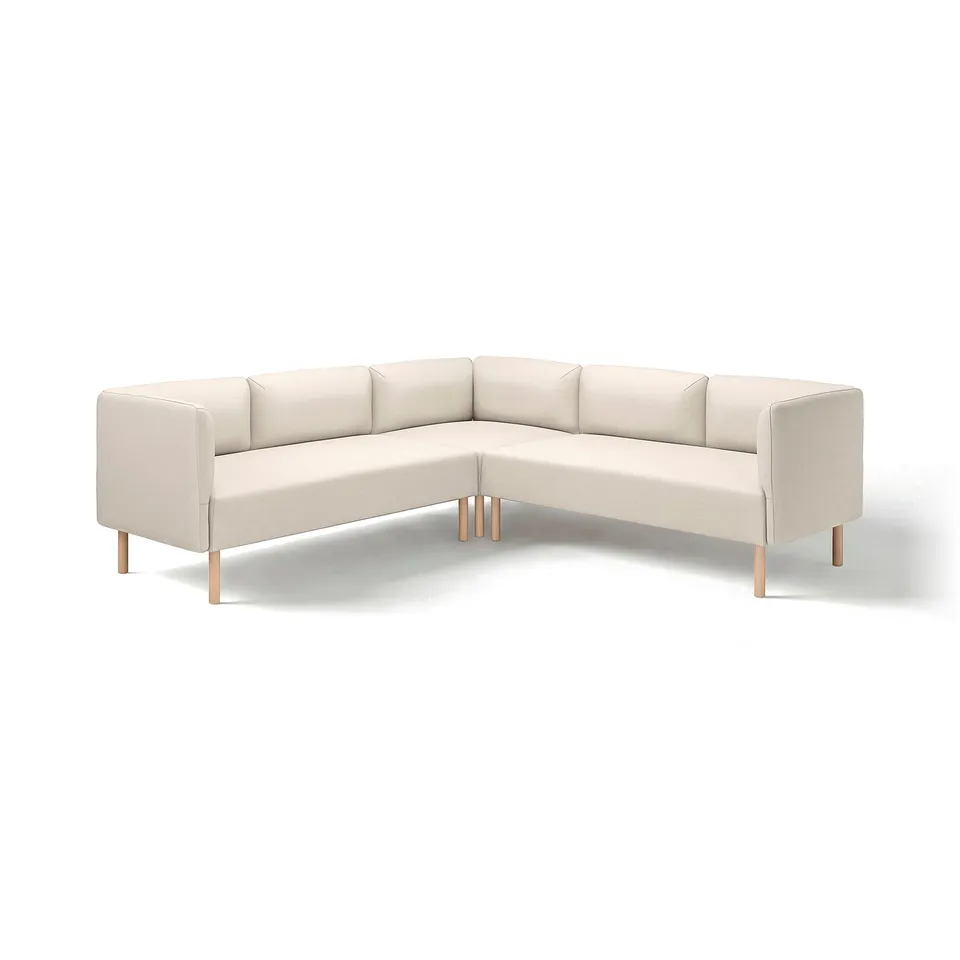 A LILLEHEM modular beige sofa with square cushions, wooden legs, and a modern design.