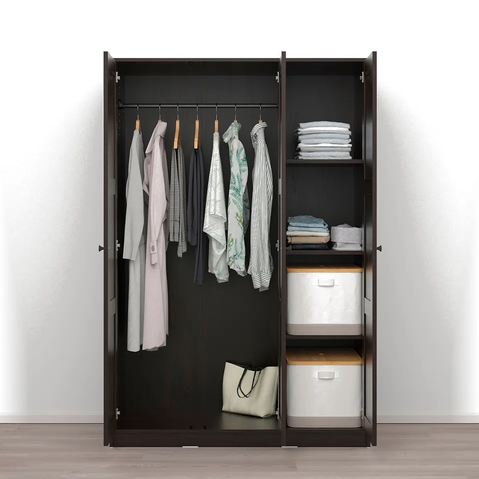 Open dark wood wardrobe revealing clothes on hangers and folded stacks on shelves.