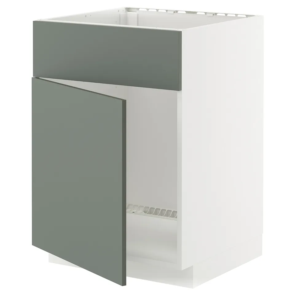 White and grey-green kitchen cabinet with one open drawer.