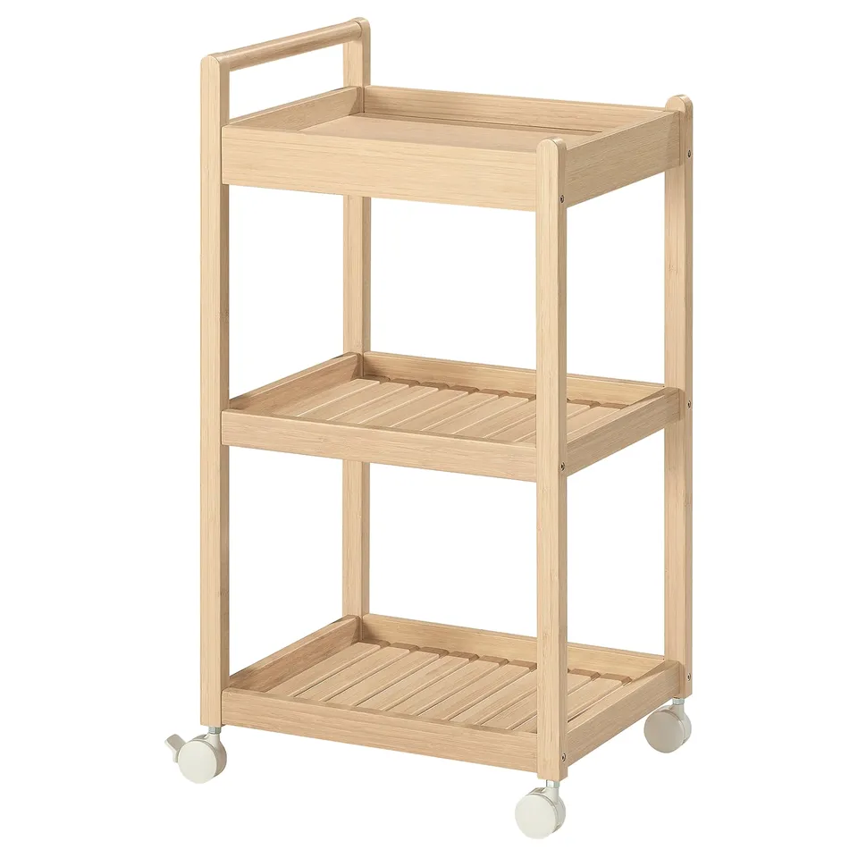 STEGESUND: wooden, light brown trolley with 3 shelves and wheels. Simple, functional design for storage.