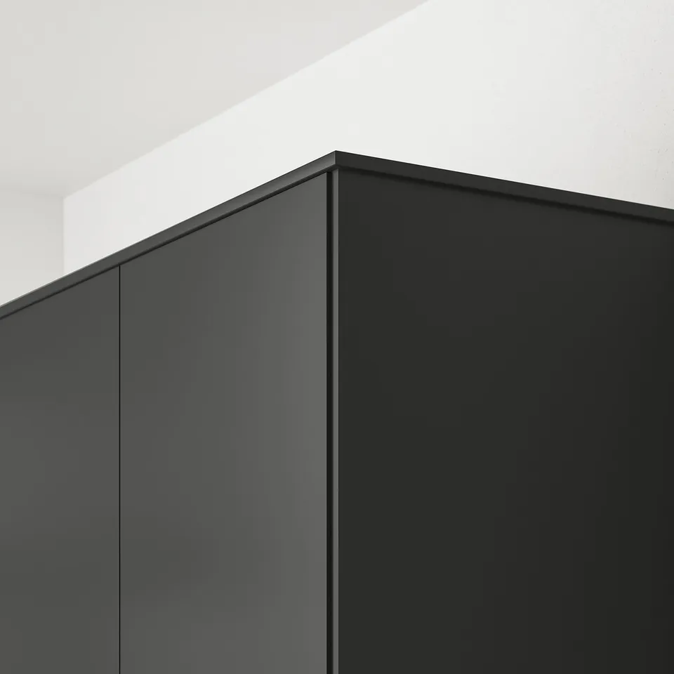Black cabinet cord cover.