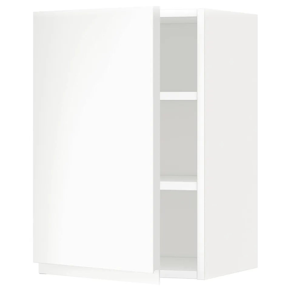 A white METOD kitchen wall cabinet with a minimalist design and an adjustable shelf.