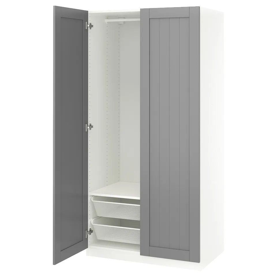 A white and grey PAX wardrobe with one door open, revealing a mesh basket and adjustable shelves inside.