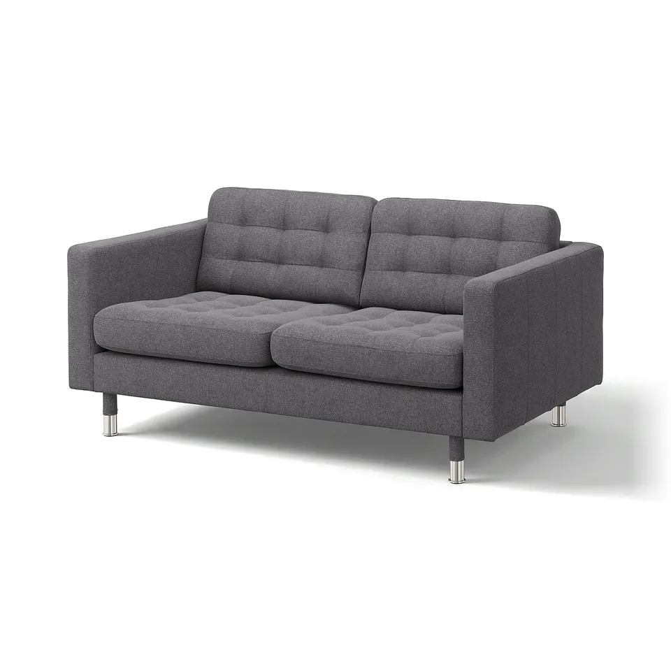 A modern grey fabric sofa named LANDSKRONA with tufted back and seat cushions supported by chrome legs.