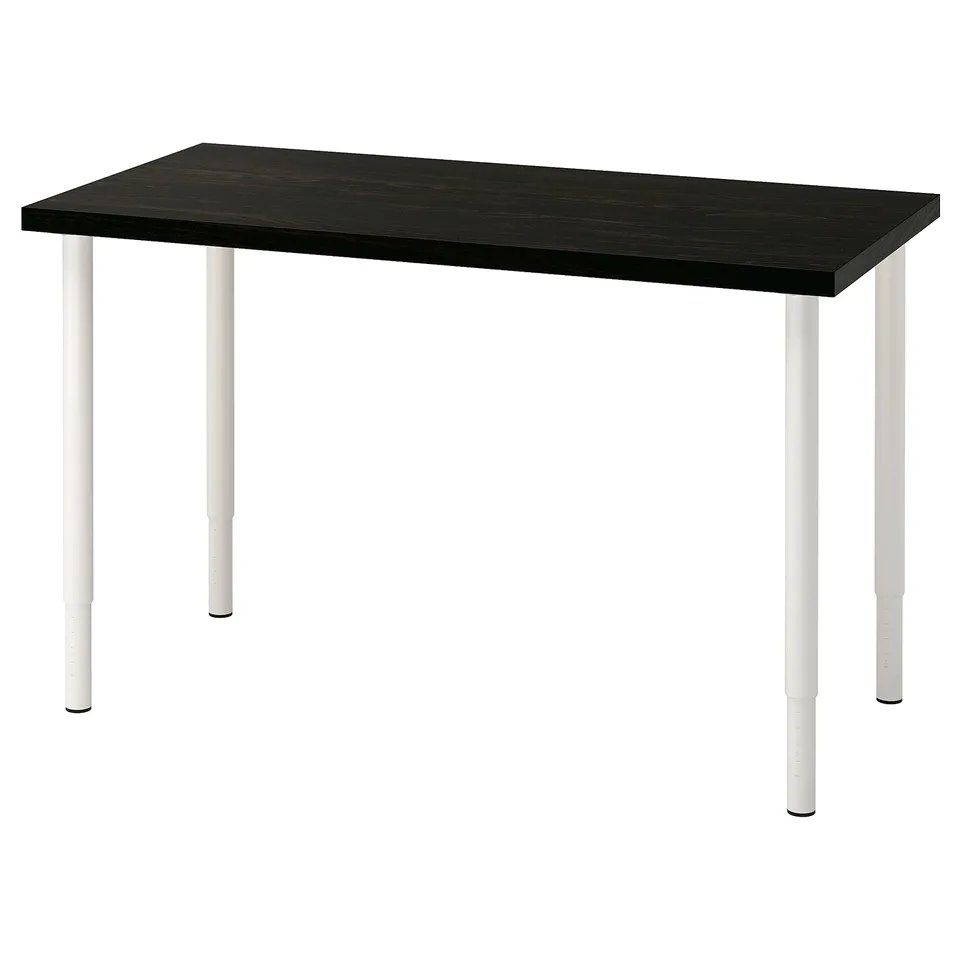 A LAGKAPTEN desk in black with white adjustable legs. Its rectangular, modern, and eco-friendly.