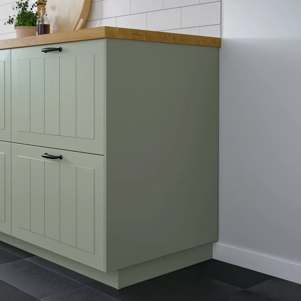 Green STENSUND fibreglass cover for under kitchen cabinets, sleek and matching.