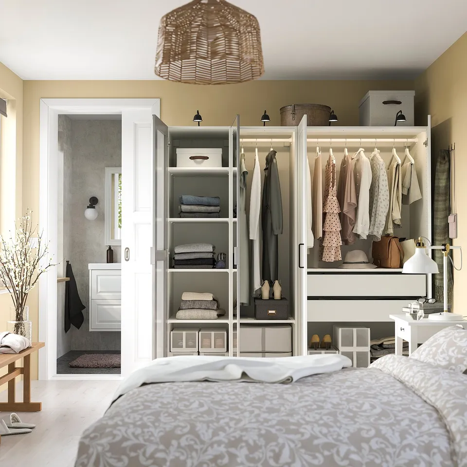 Bedroom with wardrobe and bathroom.