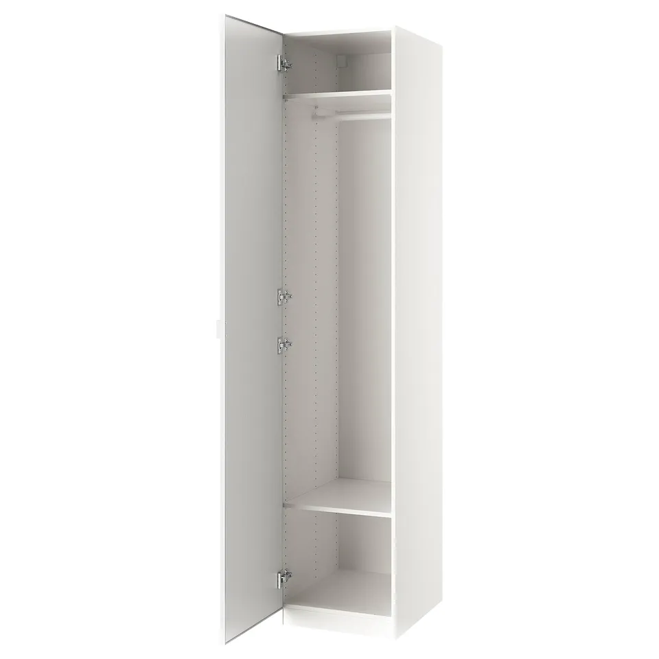 An open white PAX wardrobe with a hanging rod and shelf inside. It modern design with clean lines and minimalist style.