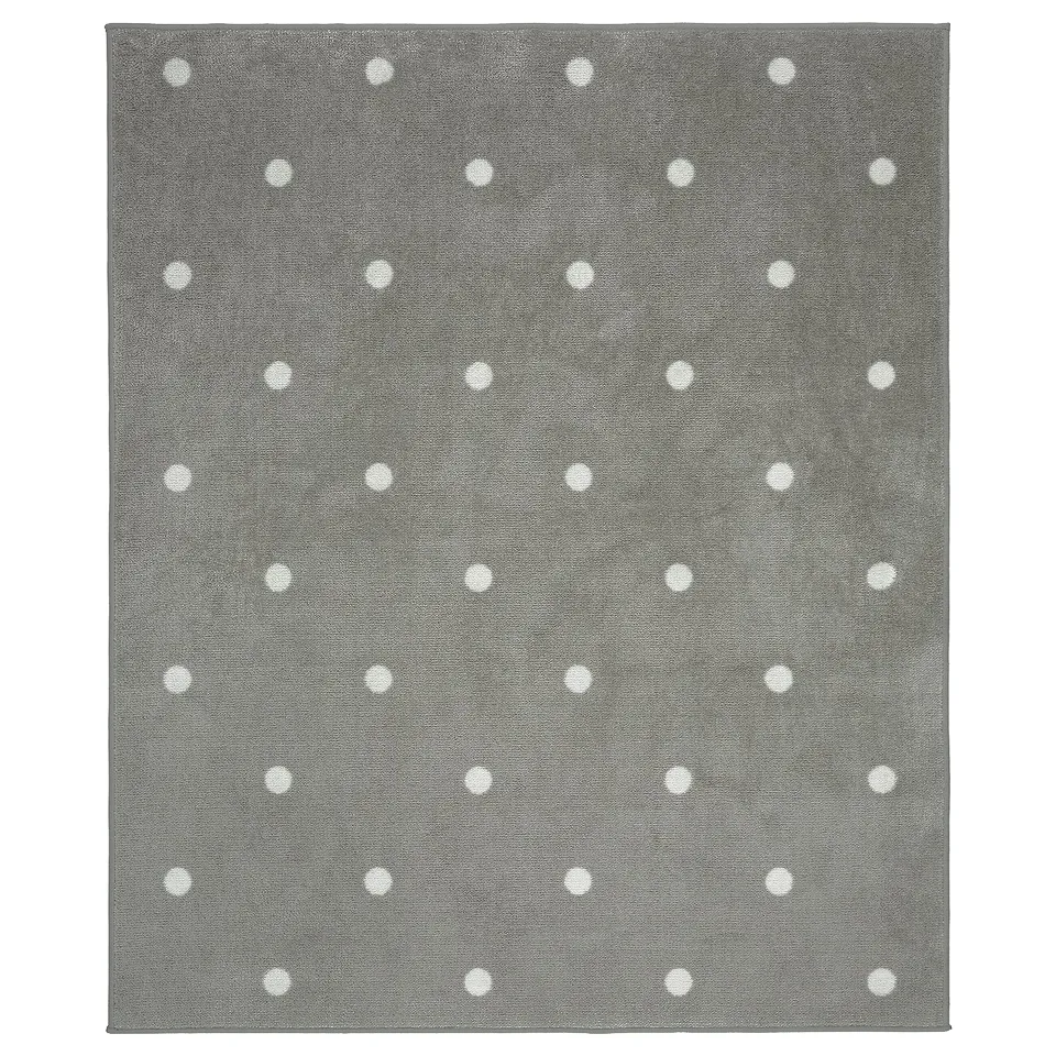 Grey rectangular rug with white dots, soft & durable.