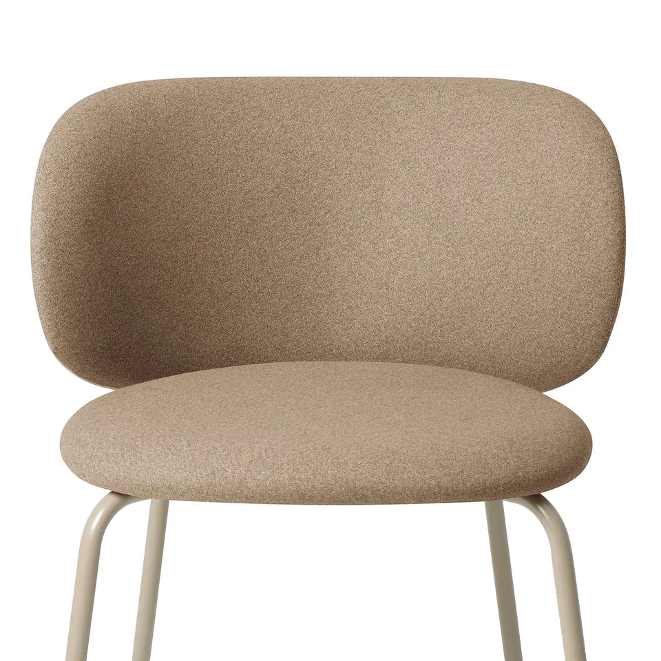 A stylish chair with a beige fabric and a sleek metal frame. The design is modern and comfortable.