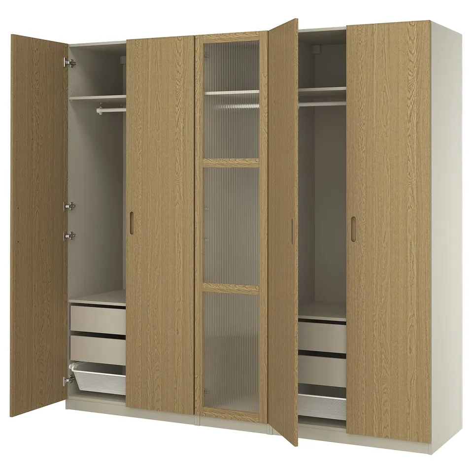 Modern wooden wardrobe, PAX, light oak finish, three doors, hanging and drawer storage, adjustable feet.