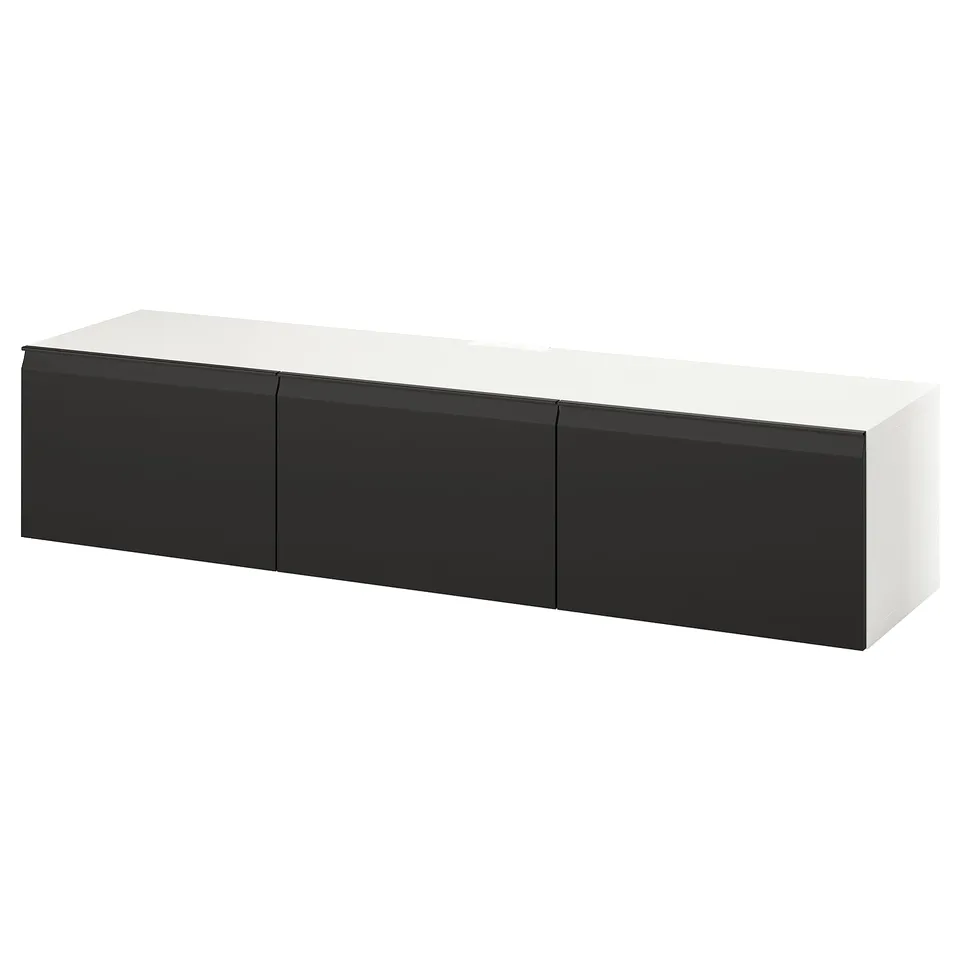 A sleek, white BESTÅ tv bench with black sides, offering tidy storage and cable management, designed for wall-mounting.