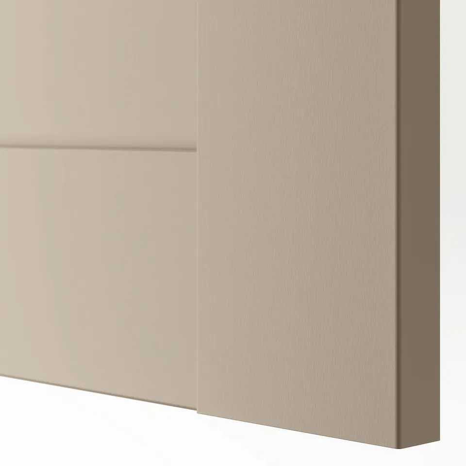 Smooth, creamy beige surface of a modern door, reflecting light softly. Clean, square design, semi-matte finish.