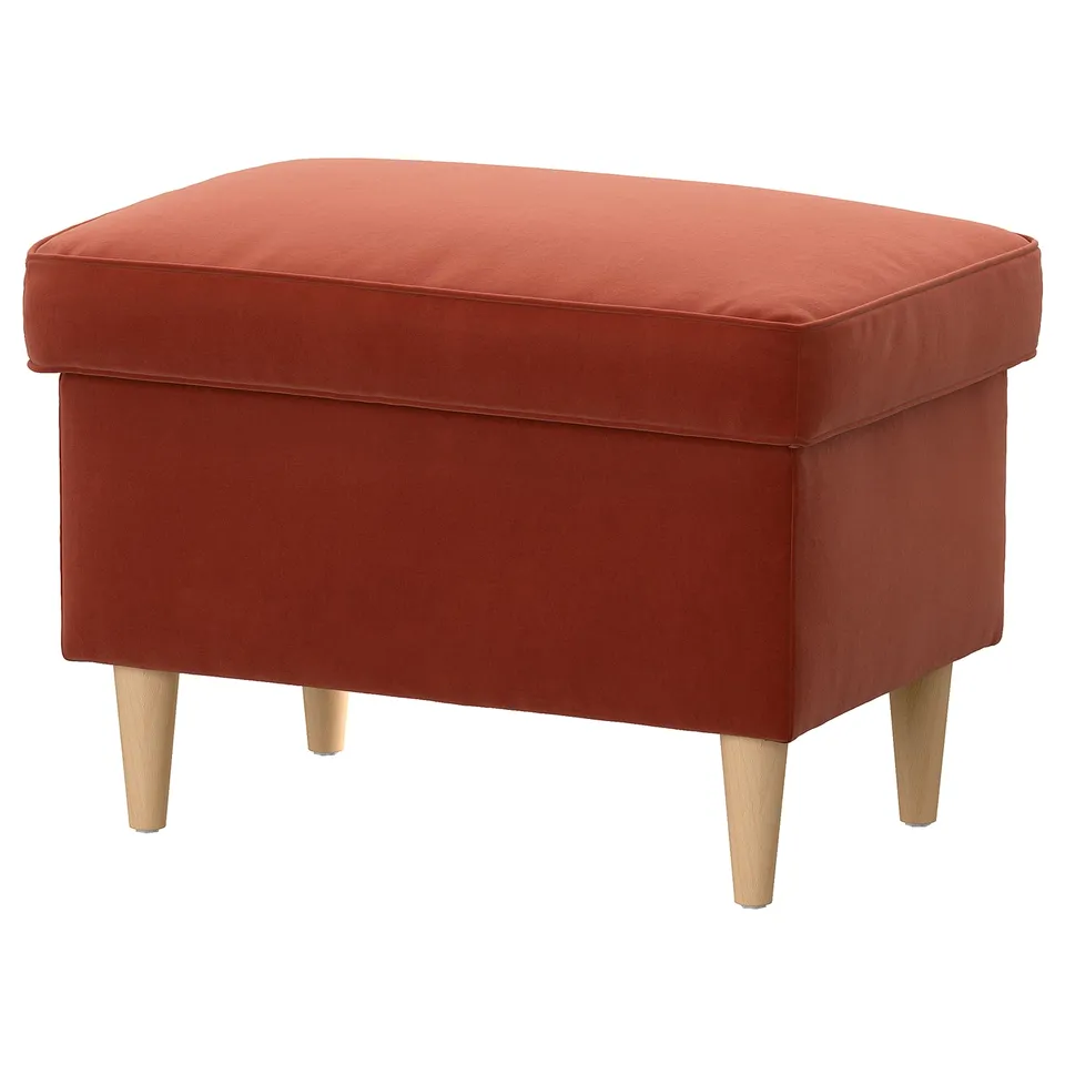 STRANDMON footstool in burnt orange fabric, square shape with wooden legs, provides extra seating & storage.
