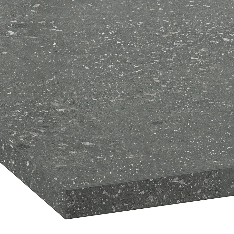 Image shows a durable, speckled grey EKBACKEN laminate countertop with a sleek, straight edge design, perfect for modern kitchens.