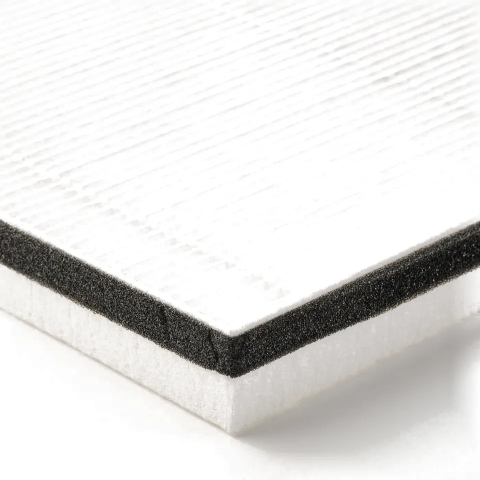 Debilitating grey air philtre with black edges, finely textured, laid flat.