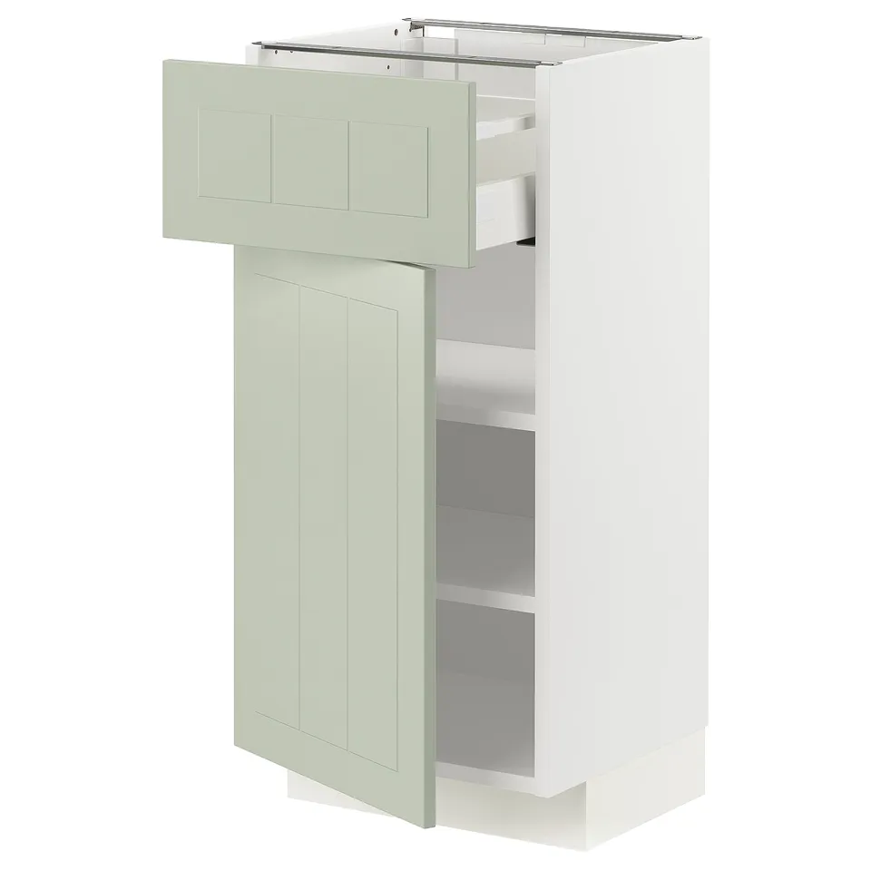 METOD kitchen cabinet with light green drawers and doors, modern design.