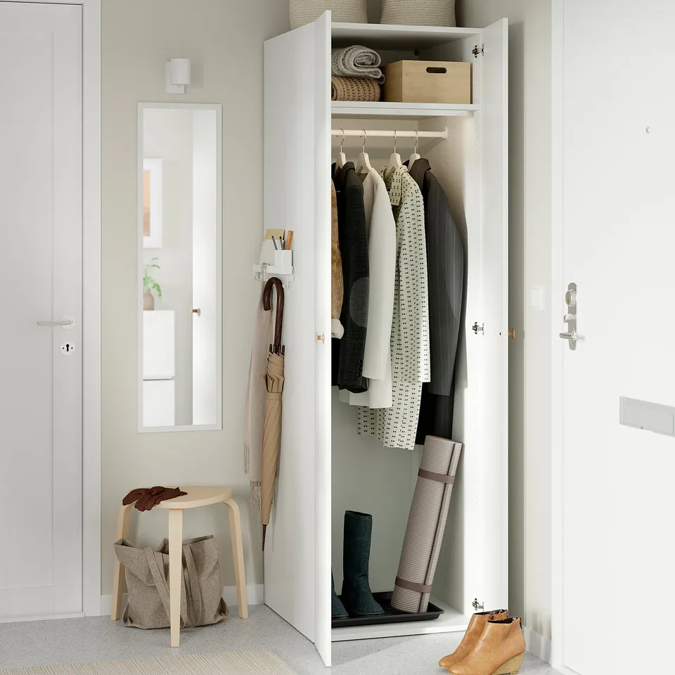 Open closet with clothes, shoes, and storage bins. Adjustable feet for floor irregularities.