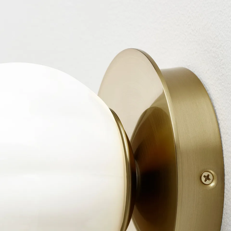 AKTERSPRING Wall lamp, wired-in installation, opal white glass/brass-plated, 15 cm