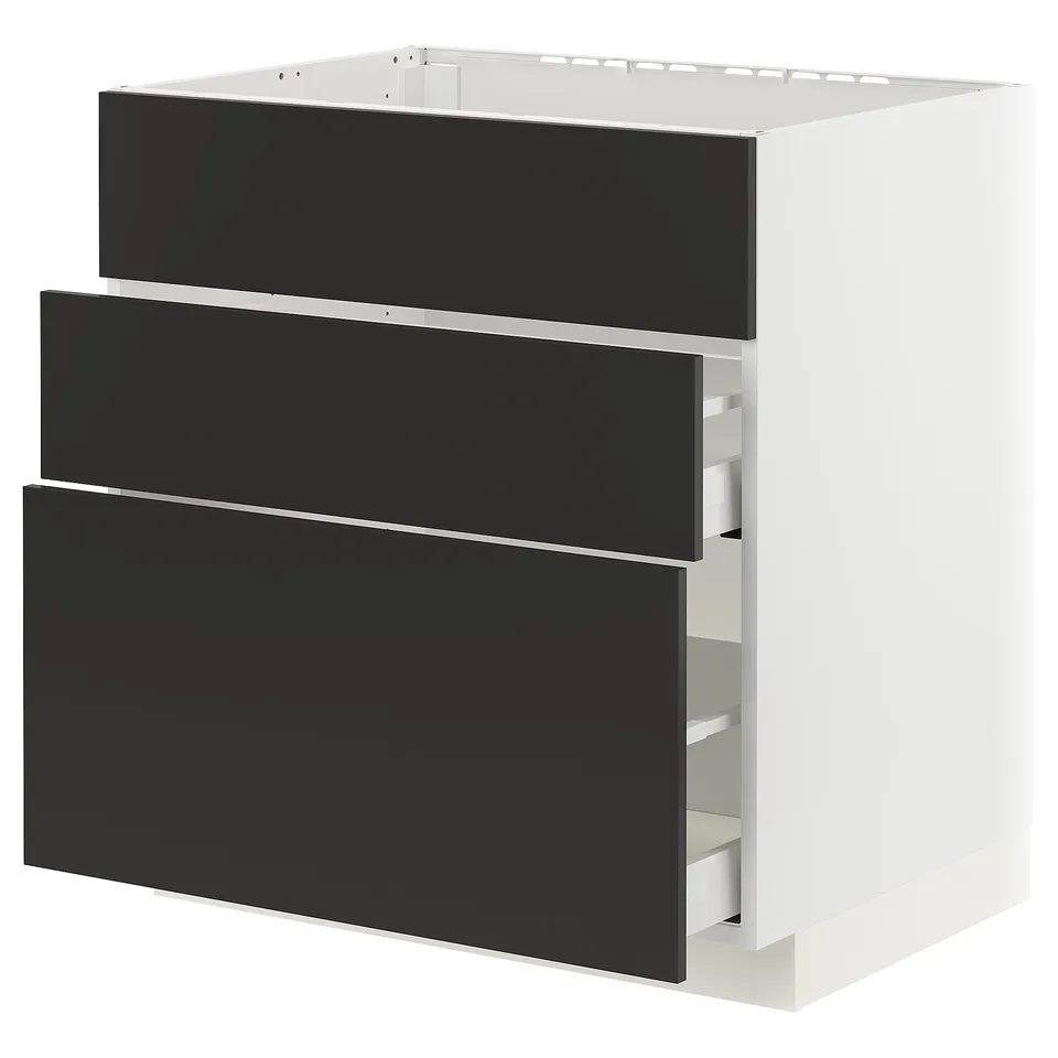 Modern kitchen unit, white with black drawers, metallic edges, sleek and minimalist.