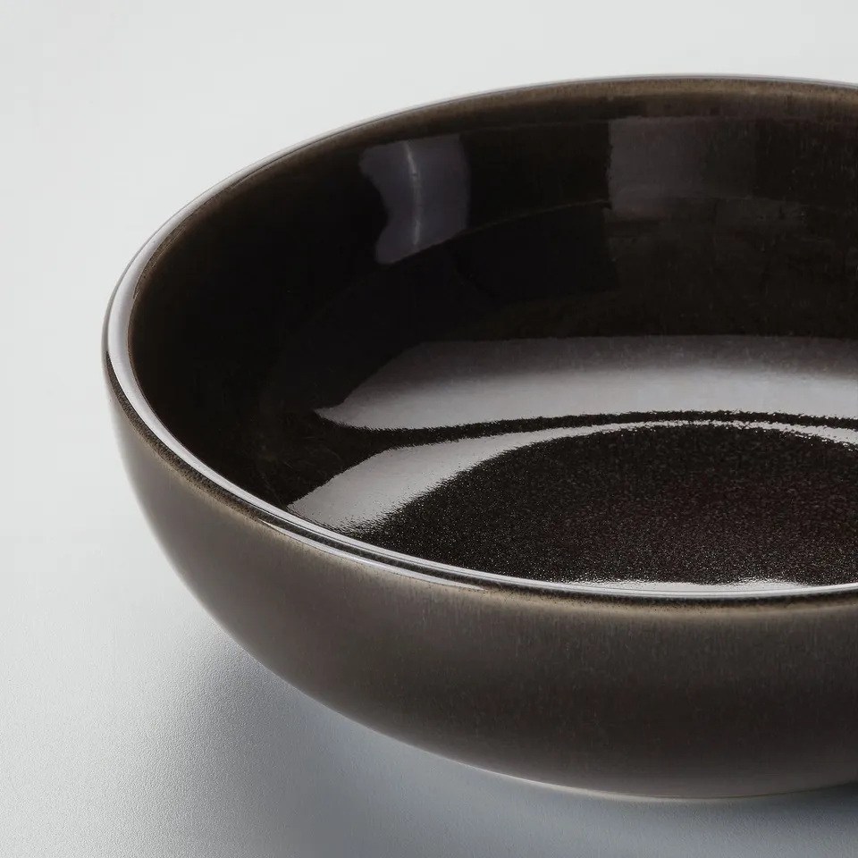 Glossy grey stoneware dish, smooth edges.
