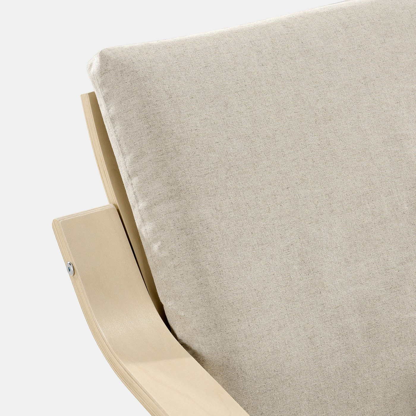 Minimalist armchair with smooth, curved backrest and plush cushioning, showcasing modern design and comfort.