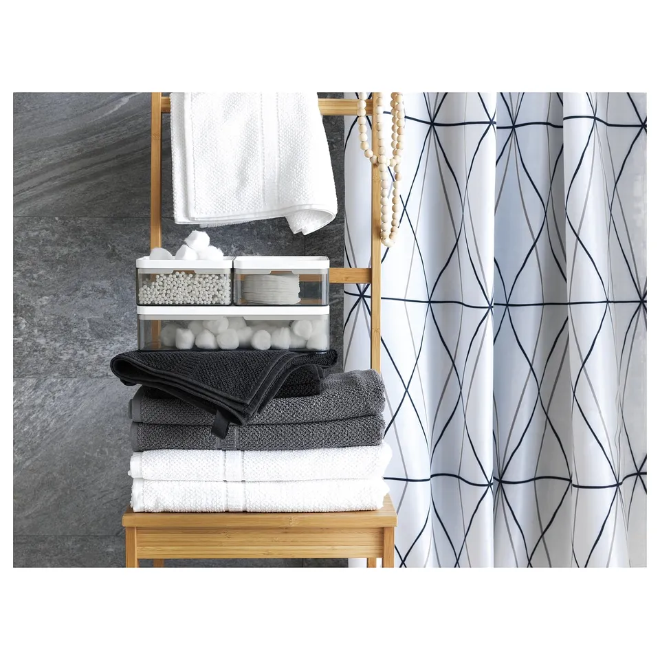 BROGRUND bathroom organiser: bamboo, white, rectangular, open shelves, towels, dome-shaped containers.
