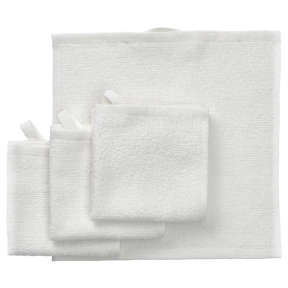 A white LUDDVIAL towel set. Made of 100% cotton, it multiple sizes for versatile use. The towels are lightweight, quick-drying, and soft.